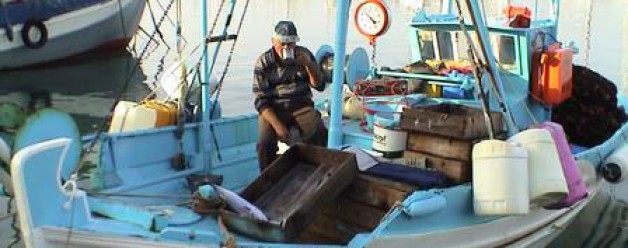 Fisherman and his boat