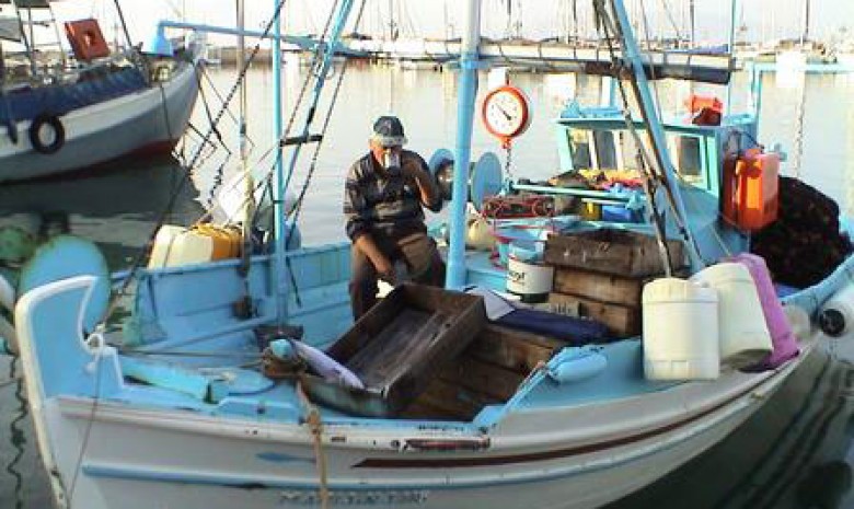 Fisherman and his boat